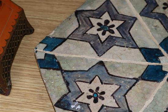 An Islamic hexagonal tile, 43cm sq.